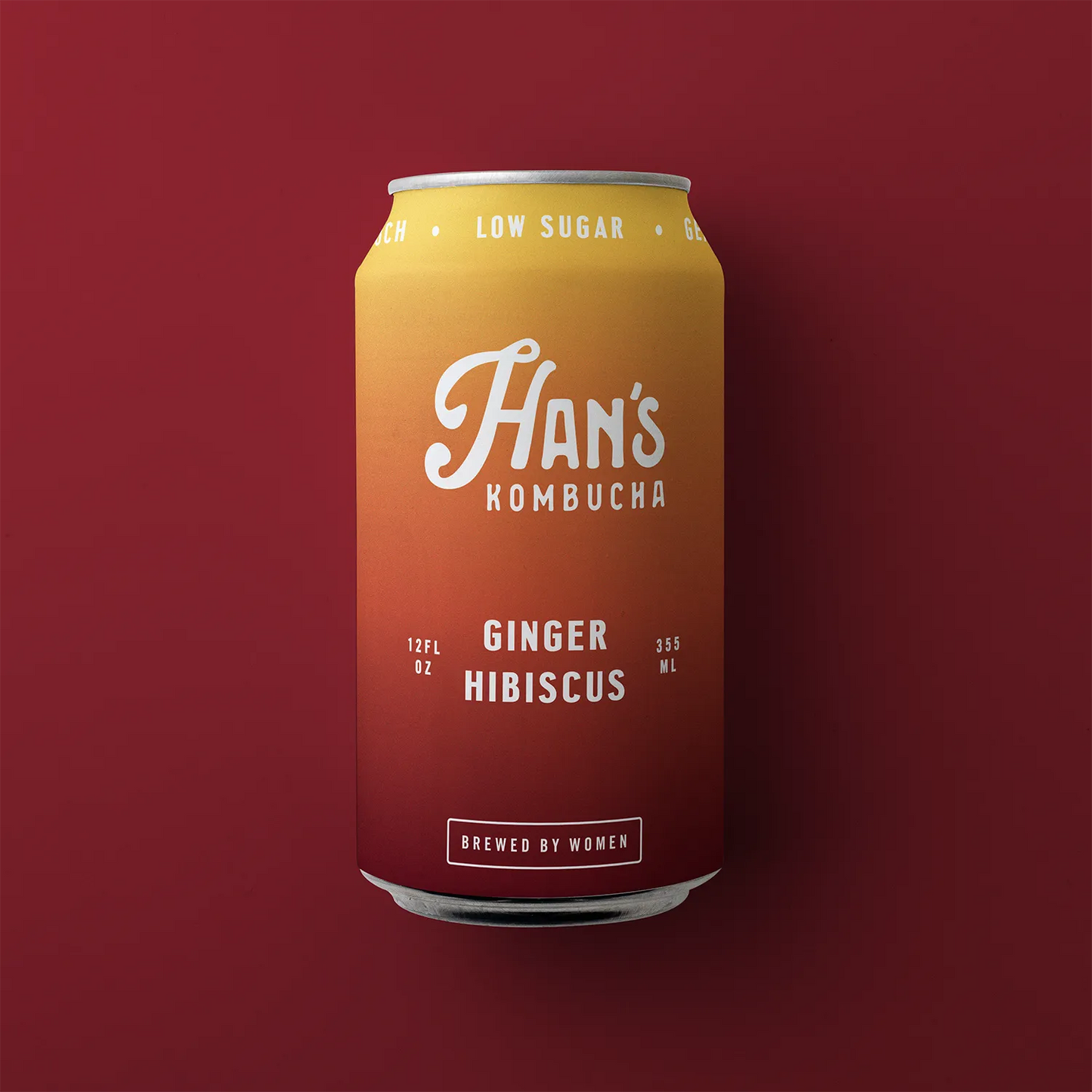 Can of Han's Kombucha Ginger Hibiscus on a red background