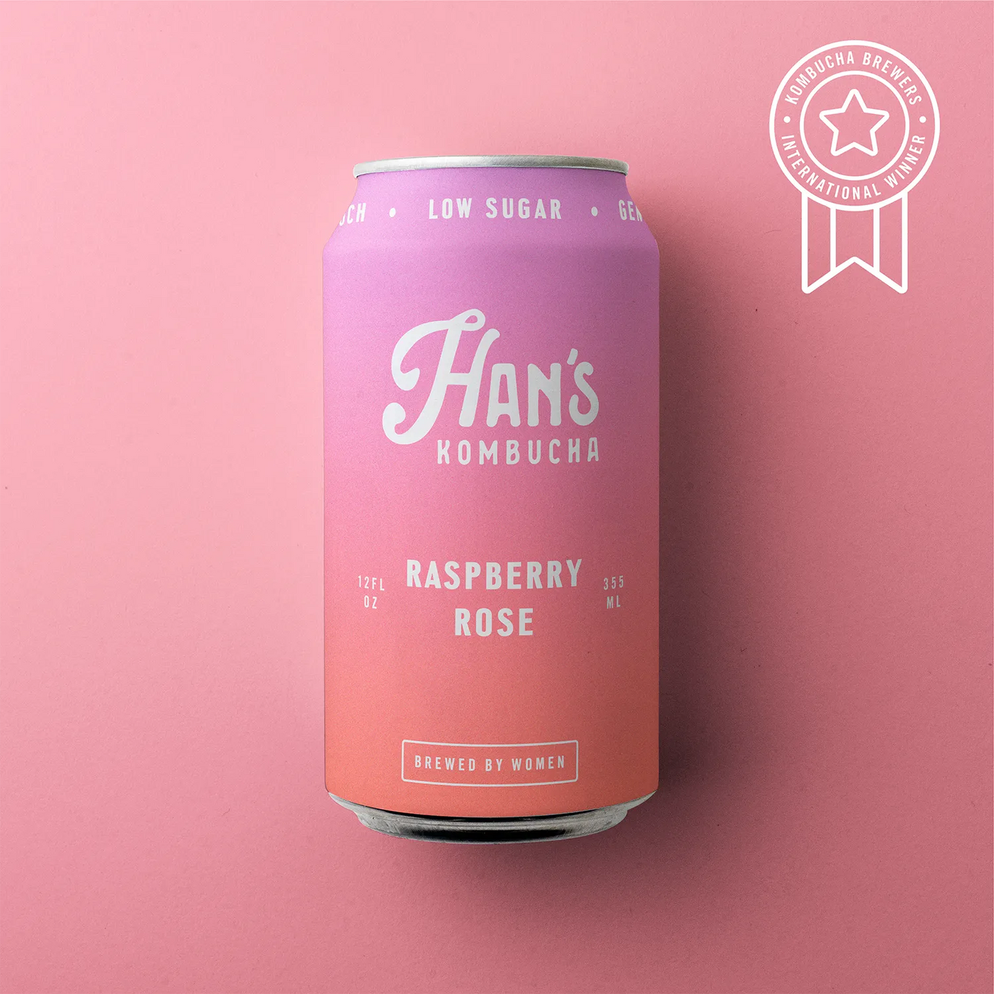 Pink can of Han's Kombucha Raspberry Rose on a pink background