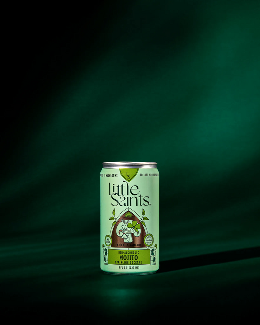 Can of Little Saints Mojito on a dark green background