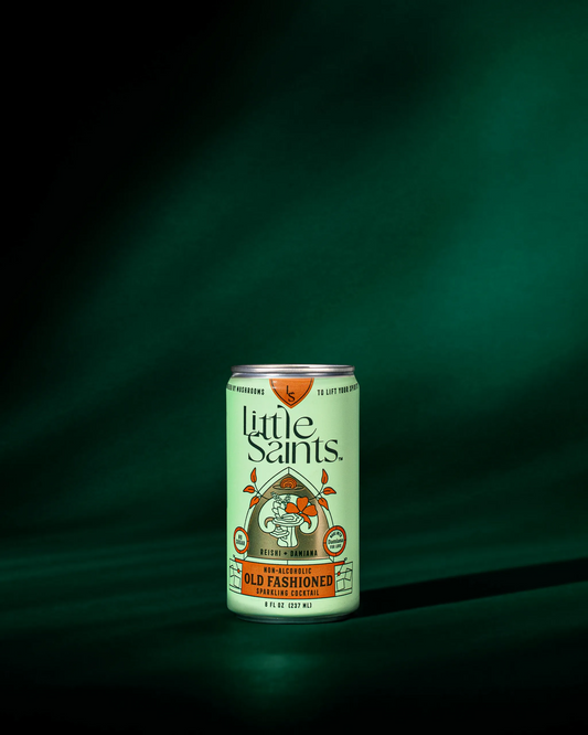 Can of 'Little Saints' Old Fashioned cocktail mix on a dark green background