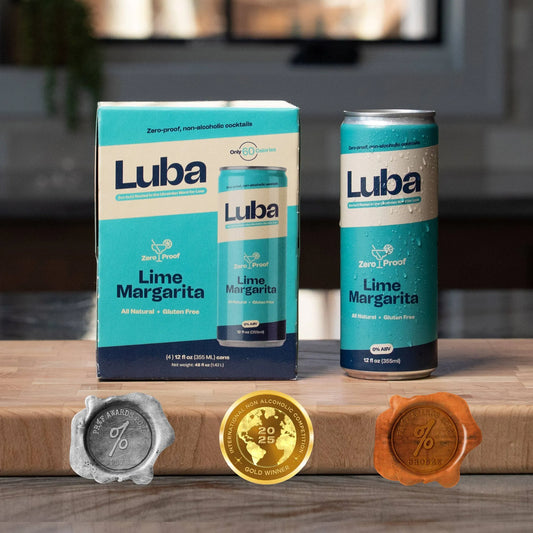 Luba Lime Margarita packaging and can on a wooden surface with decorative seals.