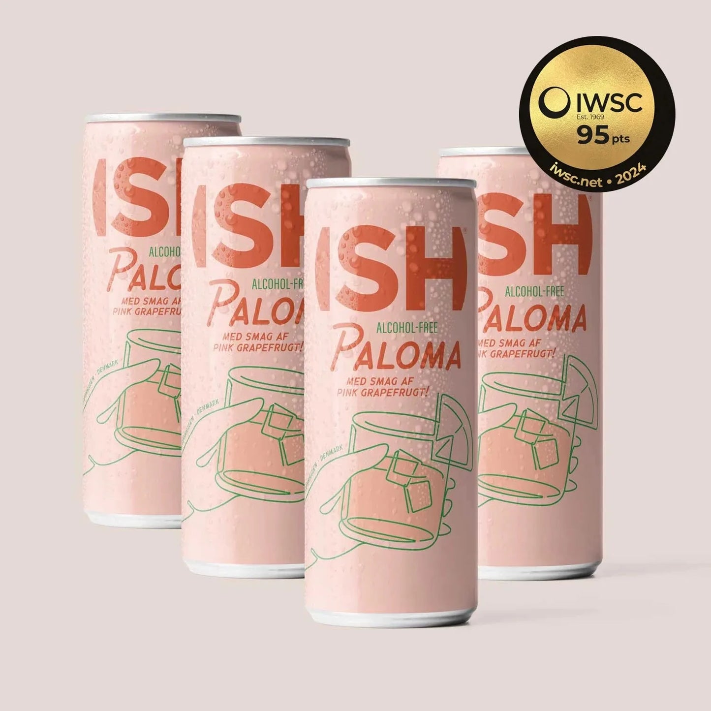 Four cans of 'ISH' Paloma on a light pink background with an IWSC gold medal award above them.