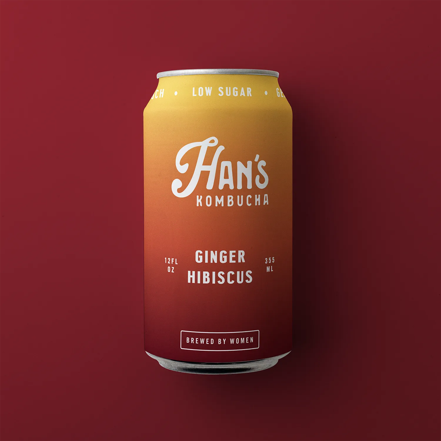 Can of Han's Kombucha Ginger Hibiscus on a red background