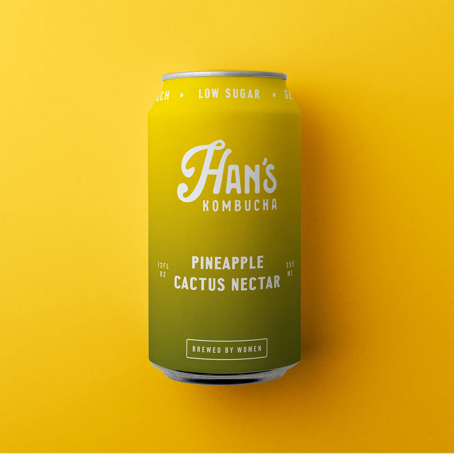 Can of Han's Kombucha Pineapple Cactus Nectar on a yellow background