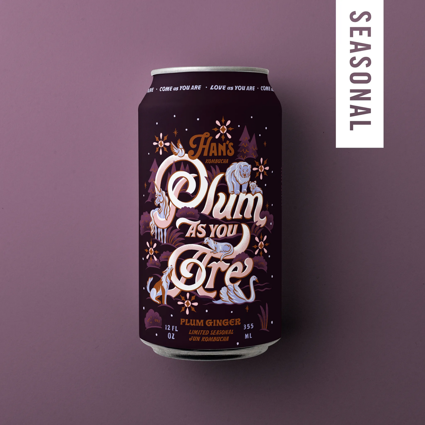 Beer can with decorative label on a purple background