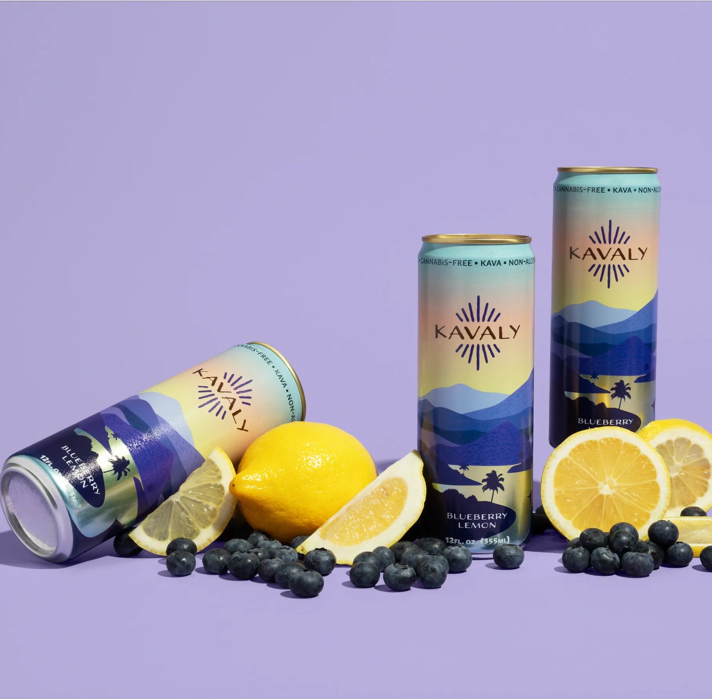 Kavaly cans with lemons and blueberries on a purple background