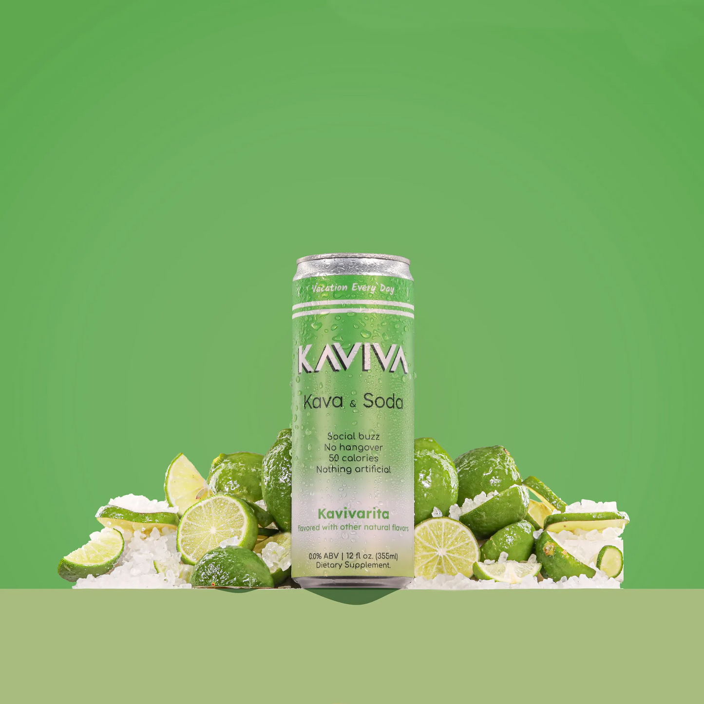 Kaviva Kava & Soda can with lime slices and ice on a green background
