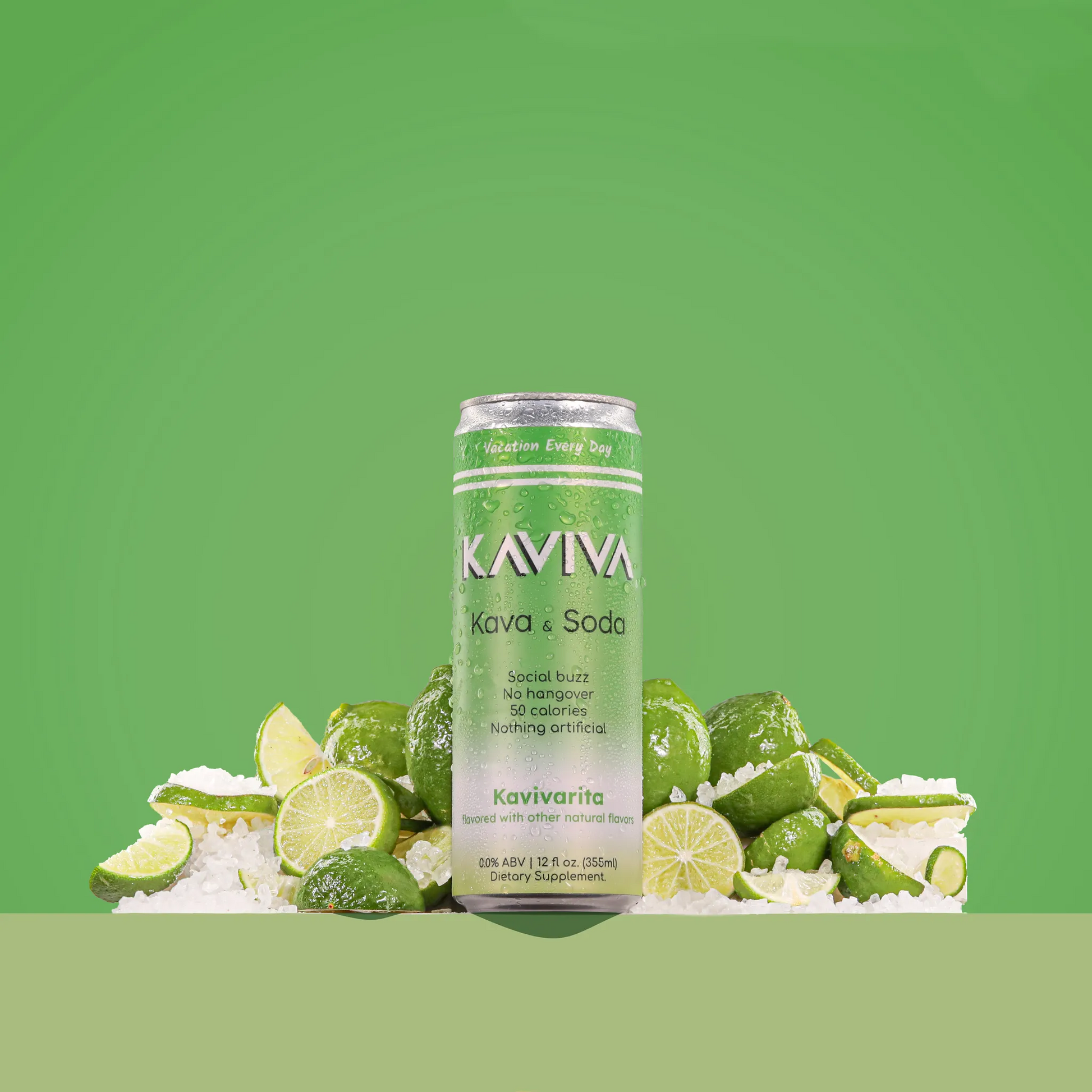 Kaviva Kava & Soda can with lime slices and ice on a green background