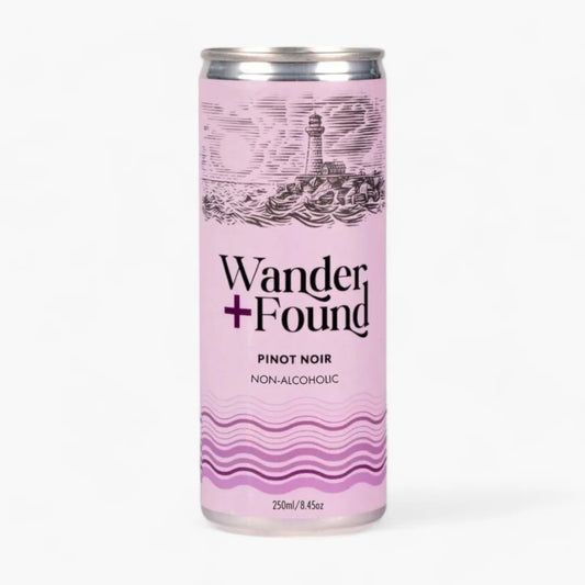 Pink can of Wander Found non-alcoholic Pinot Noir on a white background