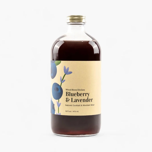 Bottle of Blueberry & Lavender syrup with a label on a white background