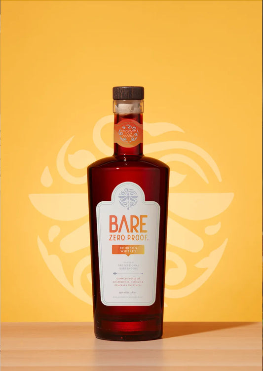 Bottle of Bare Zero Proof liquor on a yellow background