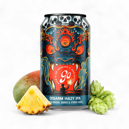 Can of Disarm Hazy IPA with pineapple and hops on a white background