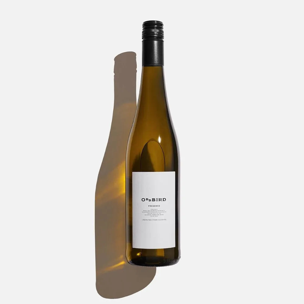 Wine bottle with a white label on a light gray background