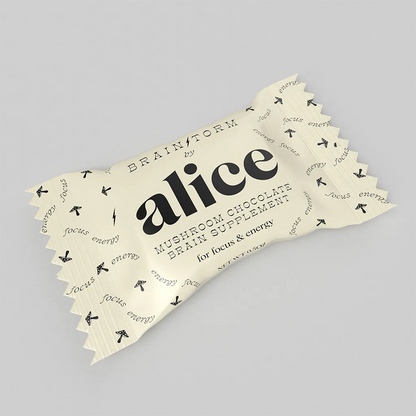 Packaging of 'alice' mushroom chocolate brain supplement on a gray background