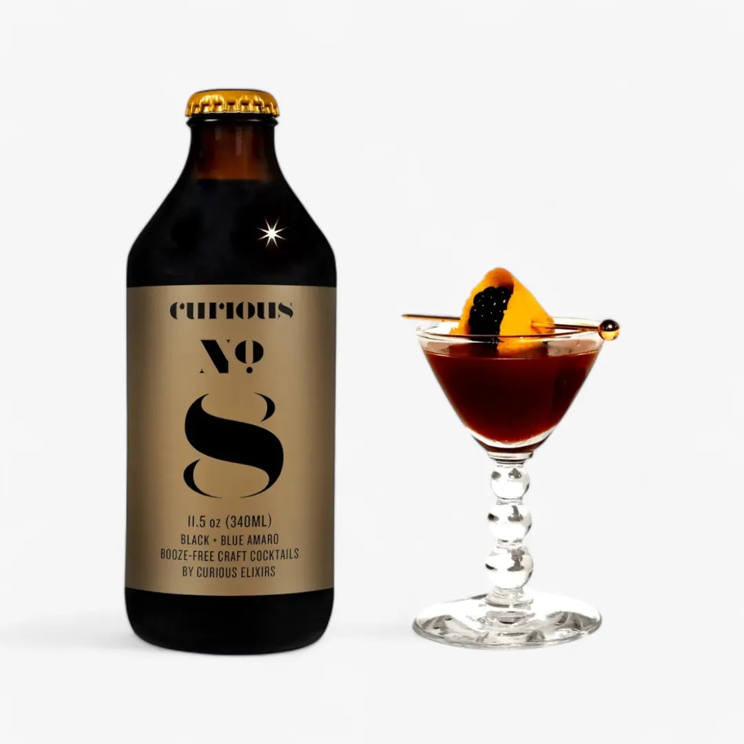Bottle of Curious No. 8 cocktail with a glass of cocktail on a white background