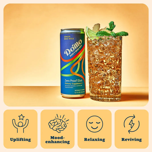 Domo Zero Proof Elixir can with a cocktail on an orange background