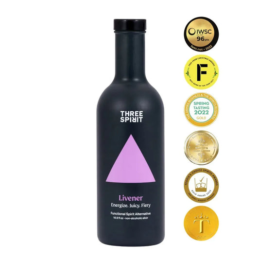Black bottle of 'Three Spirit' Livener with award badges on a white background