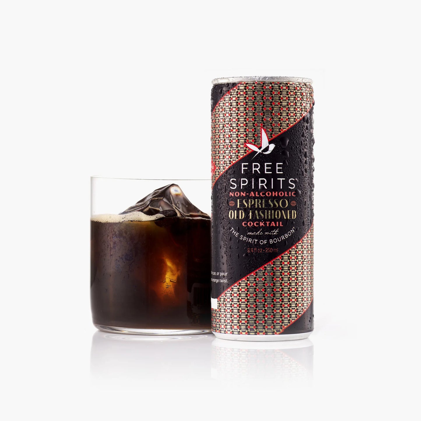 Free Spirits non-alcoholic espresso old-fashioned cocktail can with a glass of the drink on a white background