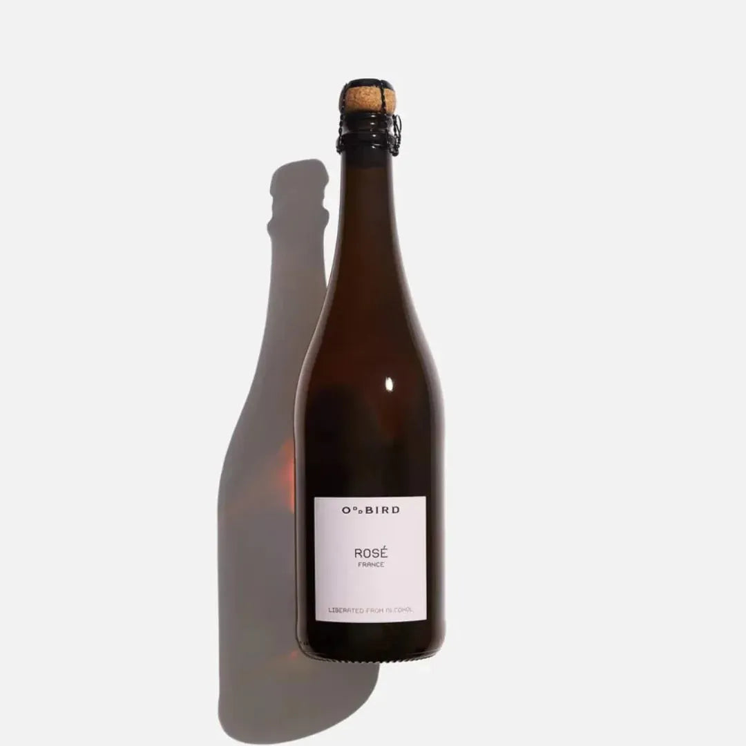 Bottle of Oddbird Rosé wine on a white background
