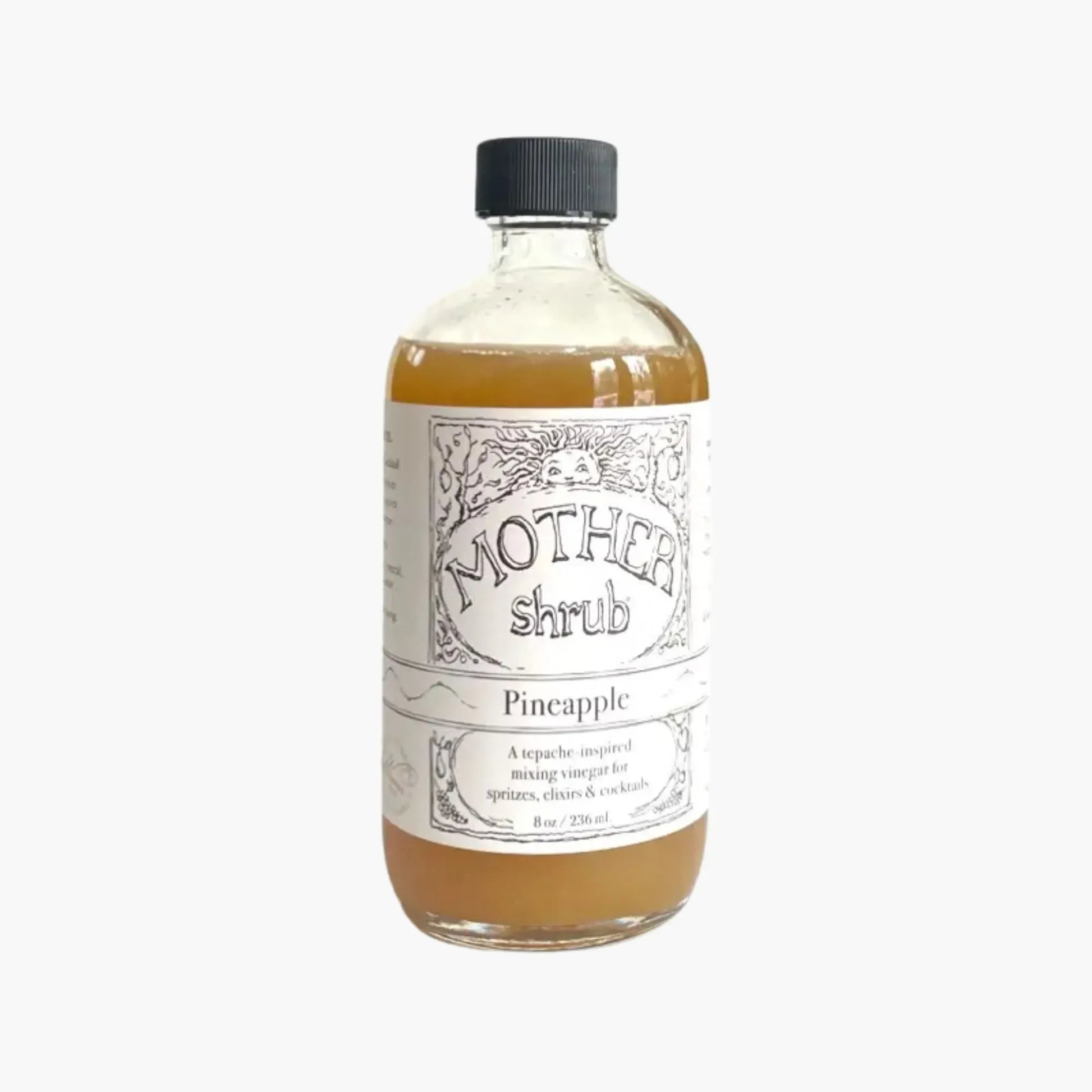 Bottle of Mother Shrub Pineapple shrub on a white background
