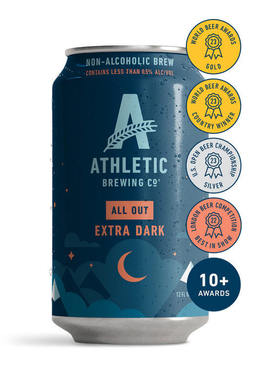 Athletic Brewing Co. non-alcoholic beer can with awards on a white background