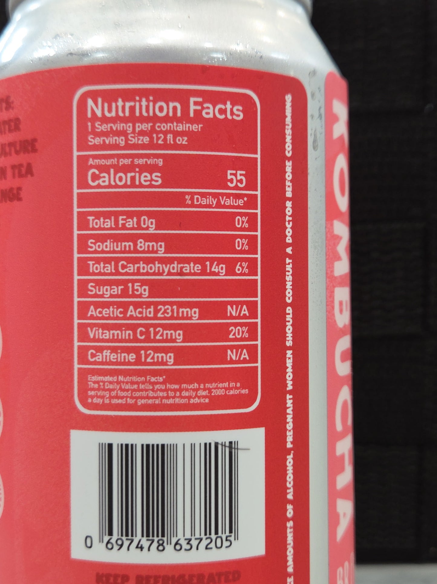Nutrition facts label on a red can with a blurred background