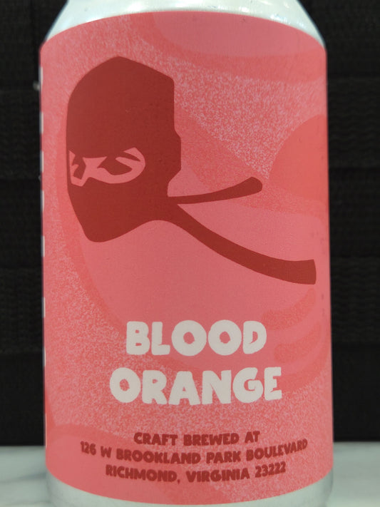 Bottle of Blood Orange craft beer with a red label featuring a silhouette of a person wearing a mask.