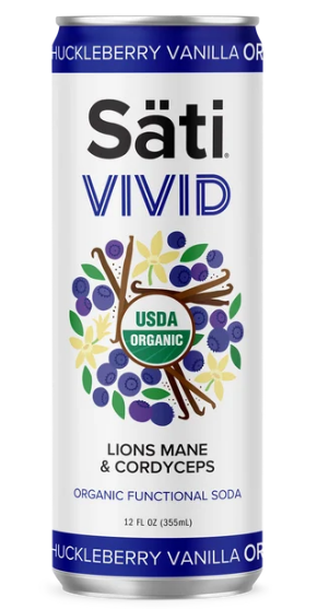 A 12 fl oz can of Säti Vivid Organic Functional Soda in Huckleberry Vanilla Orange flavor. The can features a white body with blue text and a central graphic of blueberries, cordyceps, and lions mane roots.